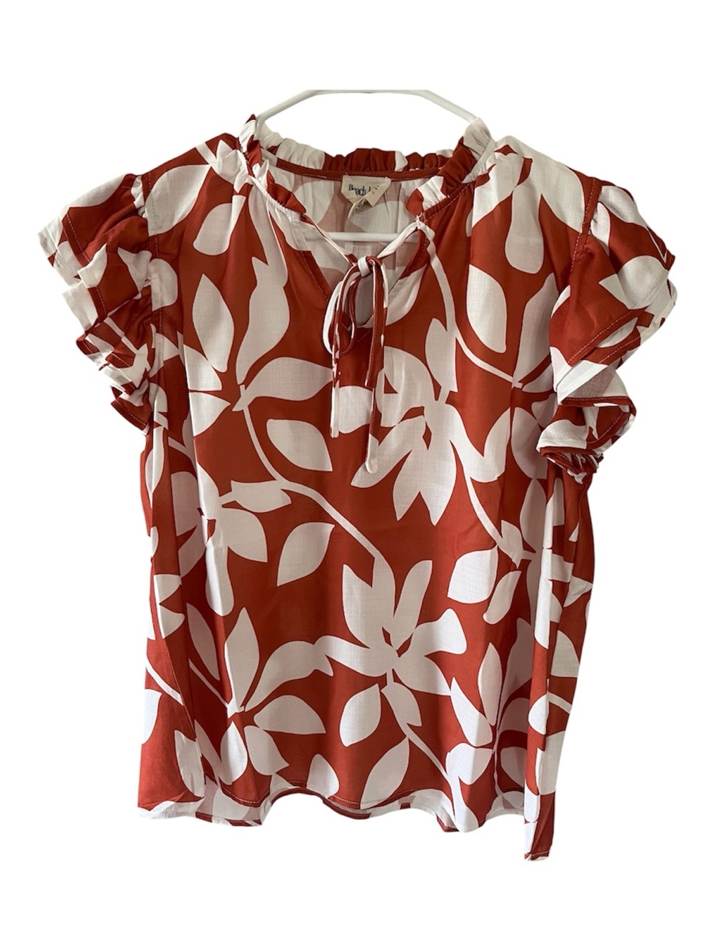 Cali Love Women’s short Sleeve top with tie neck/Orange White floral /size L/NWT